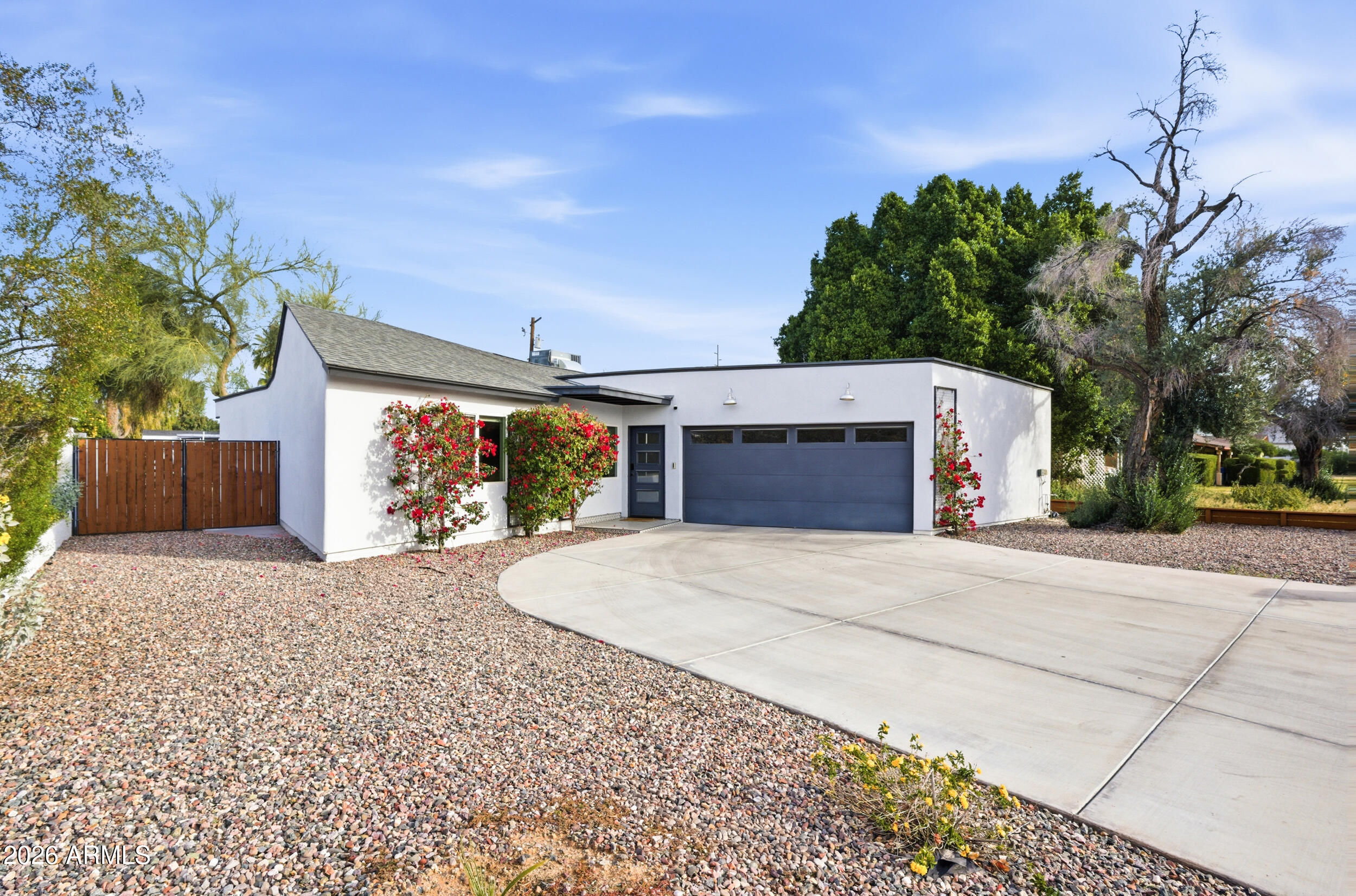 1134 East Colter Street Phoenix, AZ 85014 - Photo 2 of 27 front view of a house with a street