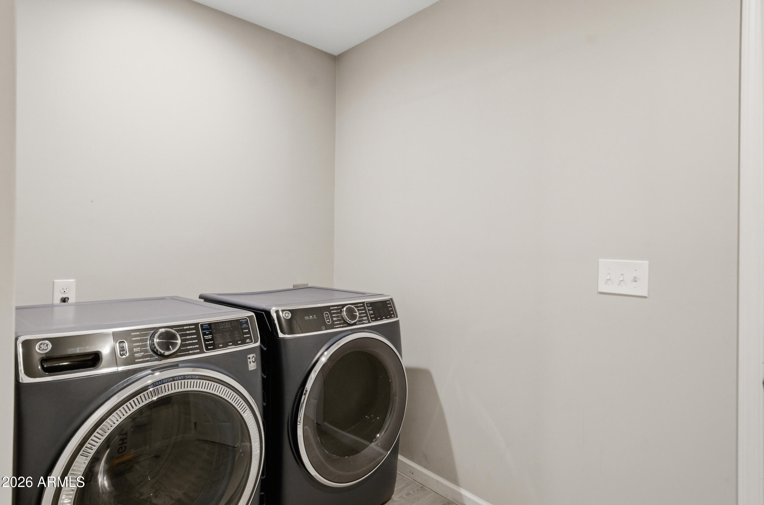 1134 East Colter Street Phoenix, AZ 85014 - Photo 22 of 27 a utility room with dryer and washer