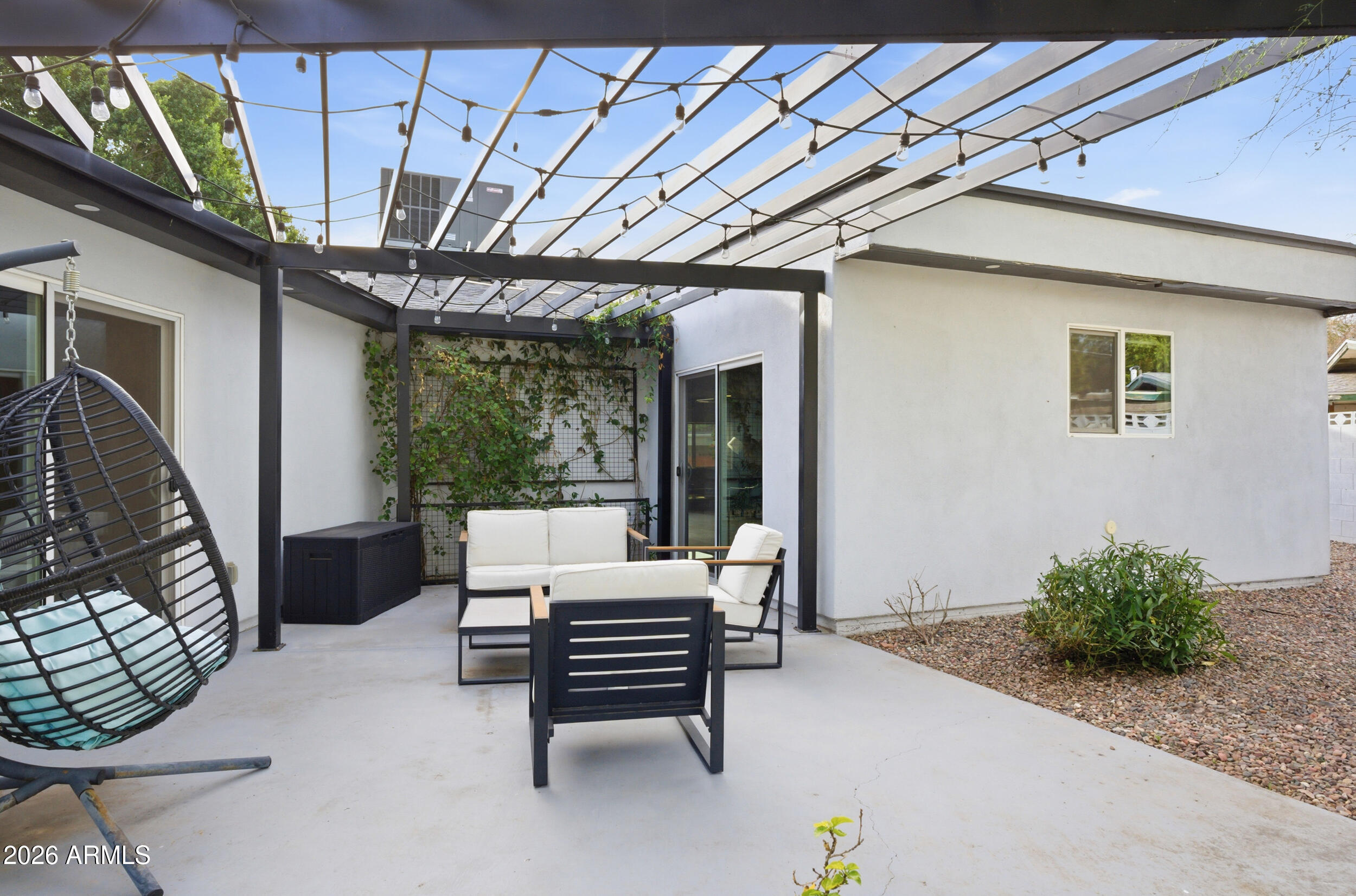 1134 East Colter Street Phoenix, AZ 85014 - Photo 24 of 27 a outdoor living space with furniture