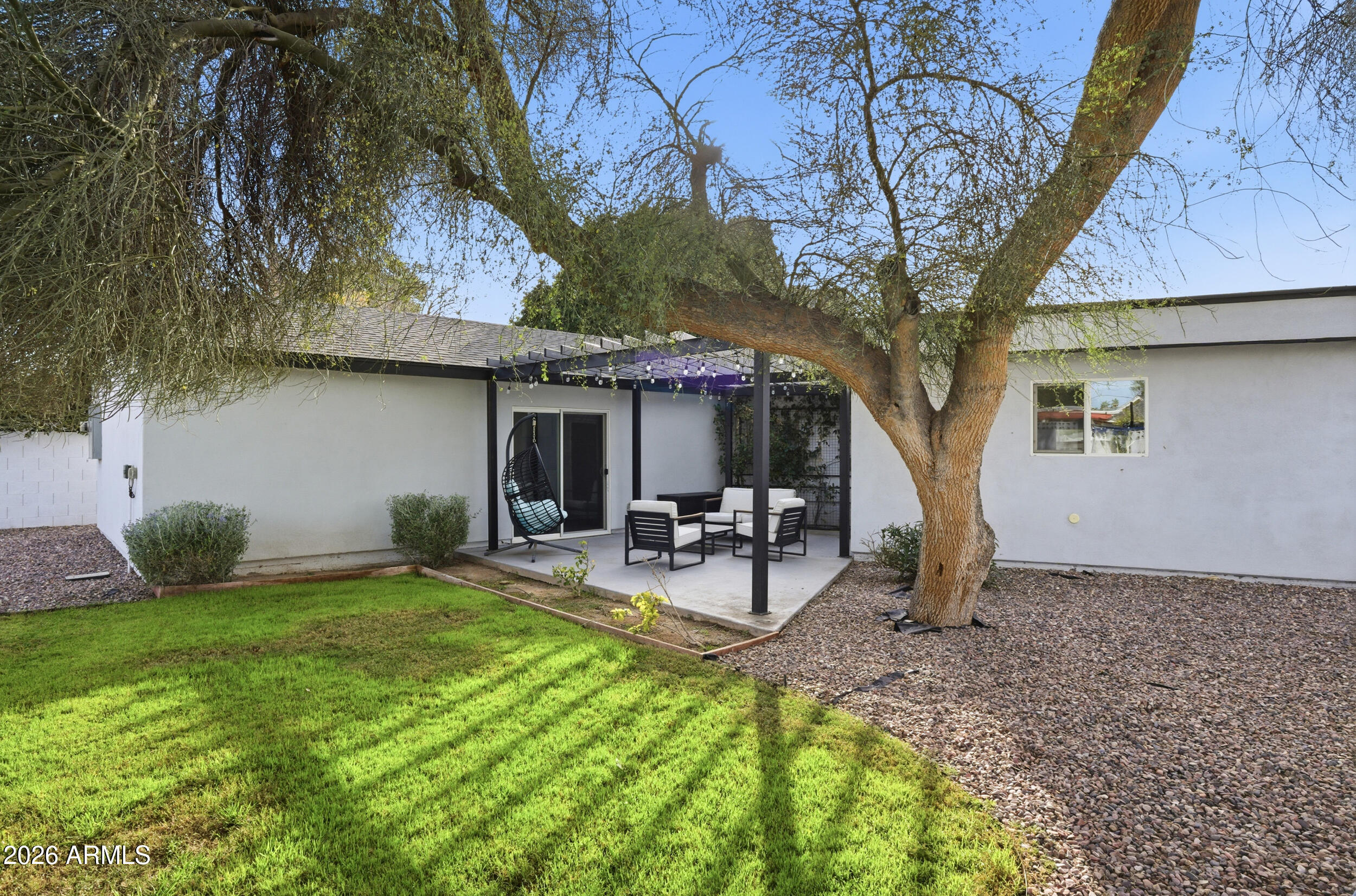 1134 East Colter Street Phoenix, AZ 85014 - Photo 25 of 27 a view of a house with backyard and sitting area