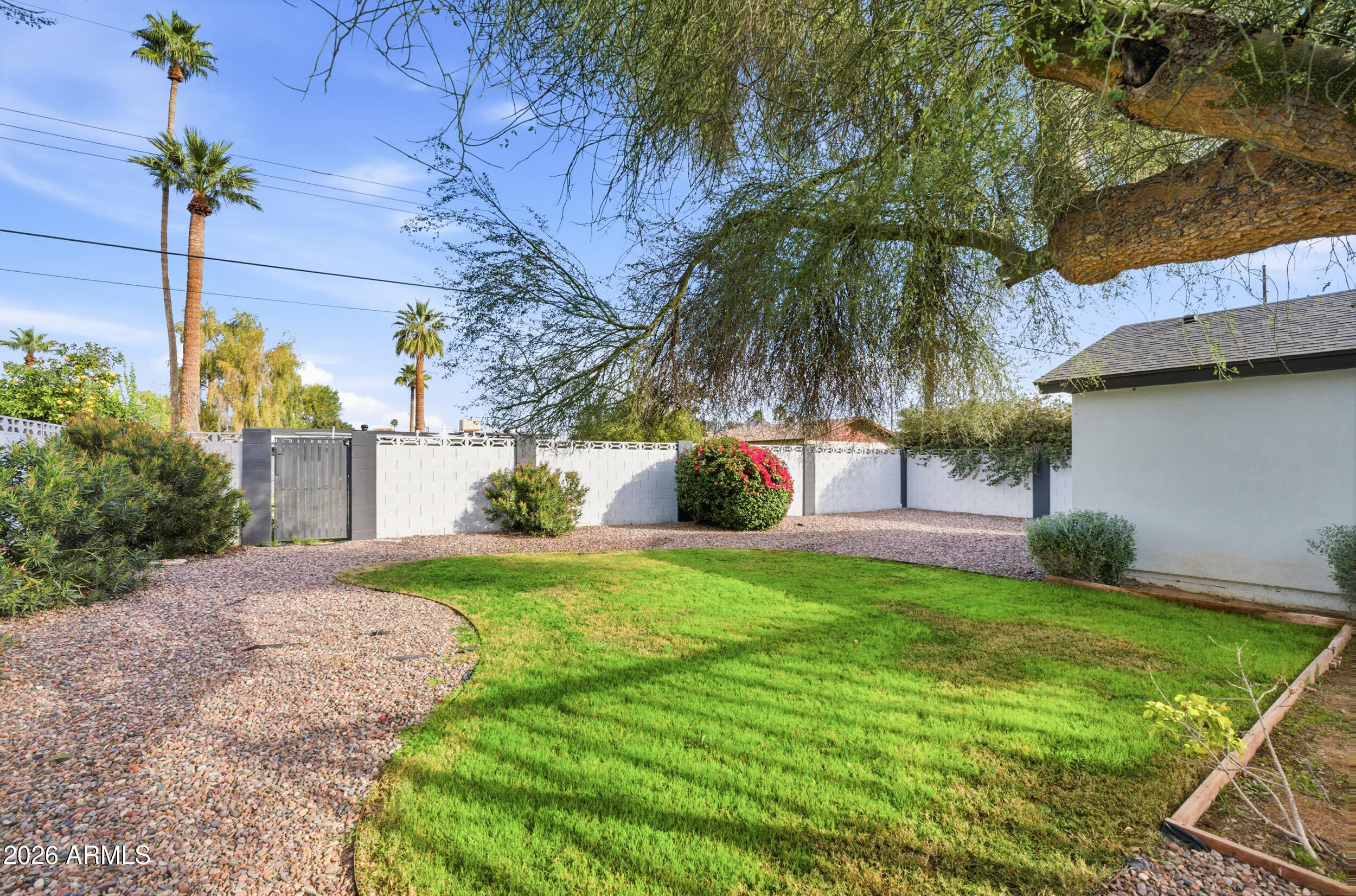 1134 East Colter Street Phoenix, AZ 85014 - Photo 27 of 27 a front view of a house with garden