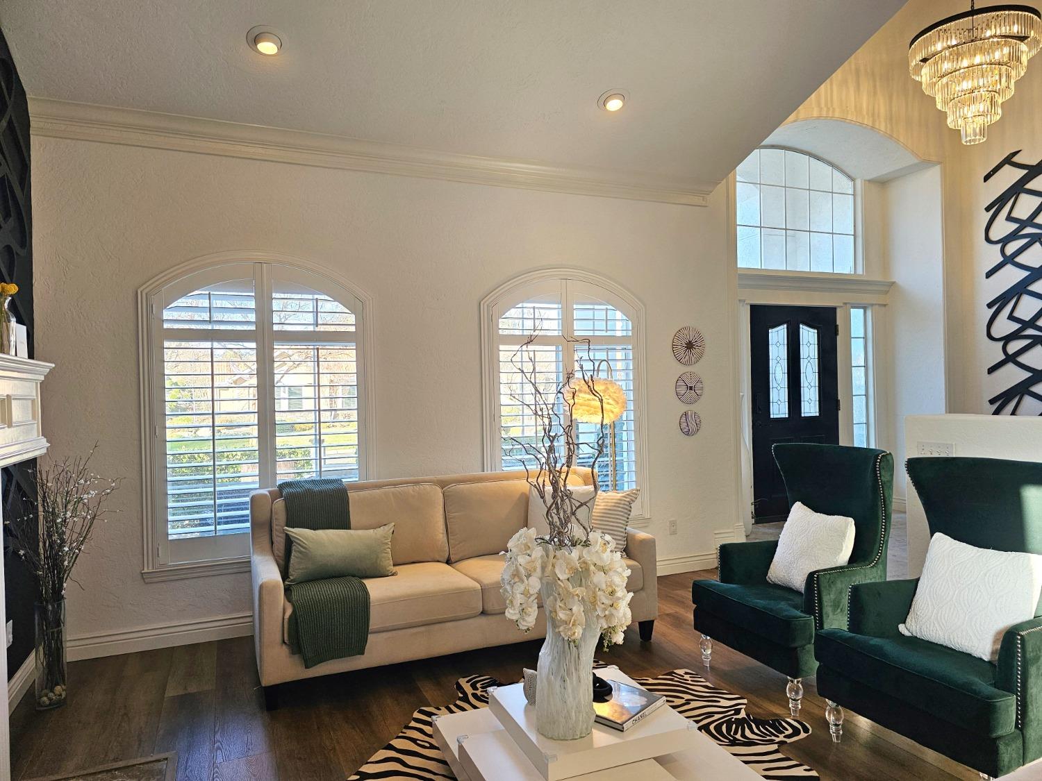 576 West Bedford Avenue Clovis, CA 93611 - Photo 12 of 79 a living room with furniture fireplace and wooden floor
