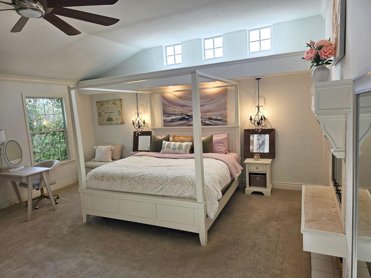 576 West Bedford Avenue Clovis, CA 93611 - Photo 42 of 79 a bedroom with a bed a table and chair