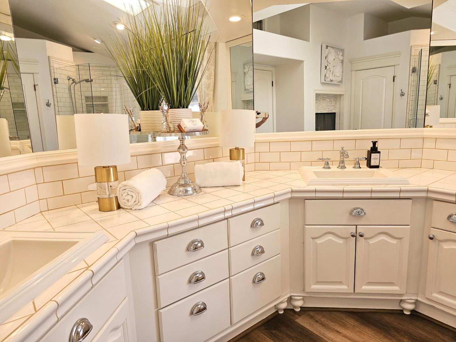 576 West Bedford Avenue Clovis, CA 93611 - Photo 50 of 79 a bathroom with a sink double vanity and a mirror