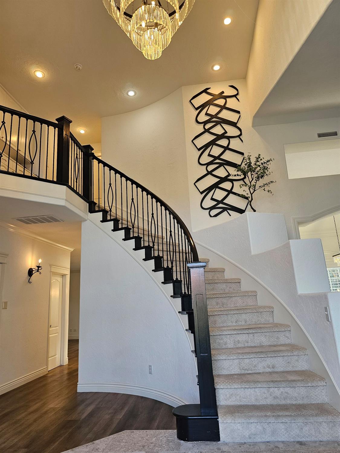 576 West Bedford Avenue Clovis, CA 93611 - Photo 5 of 79 a view of entryway with wooden floor