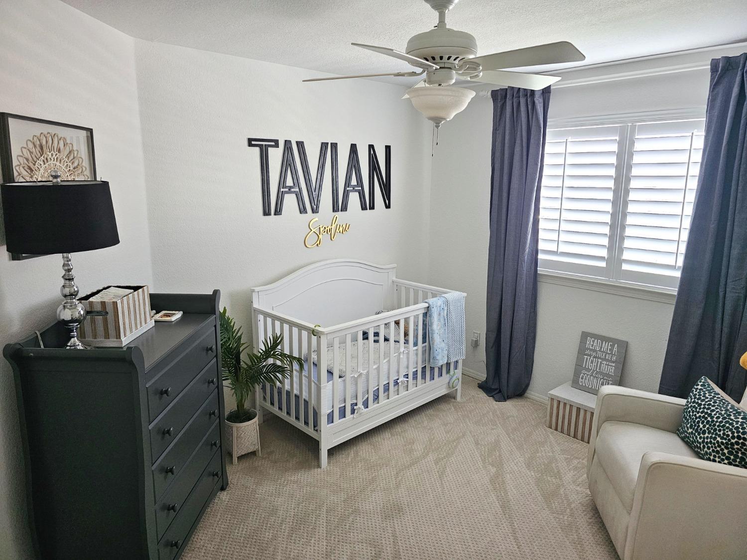 576 West Bedford Avenue Clovis, CA 93611 - Photo 55 of 79 a bedroom with furniture and a window