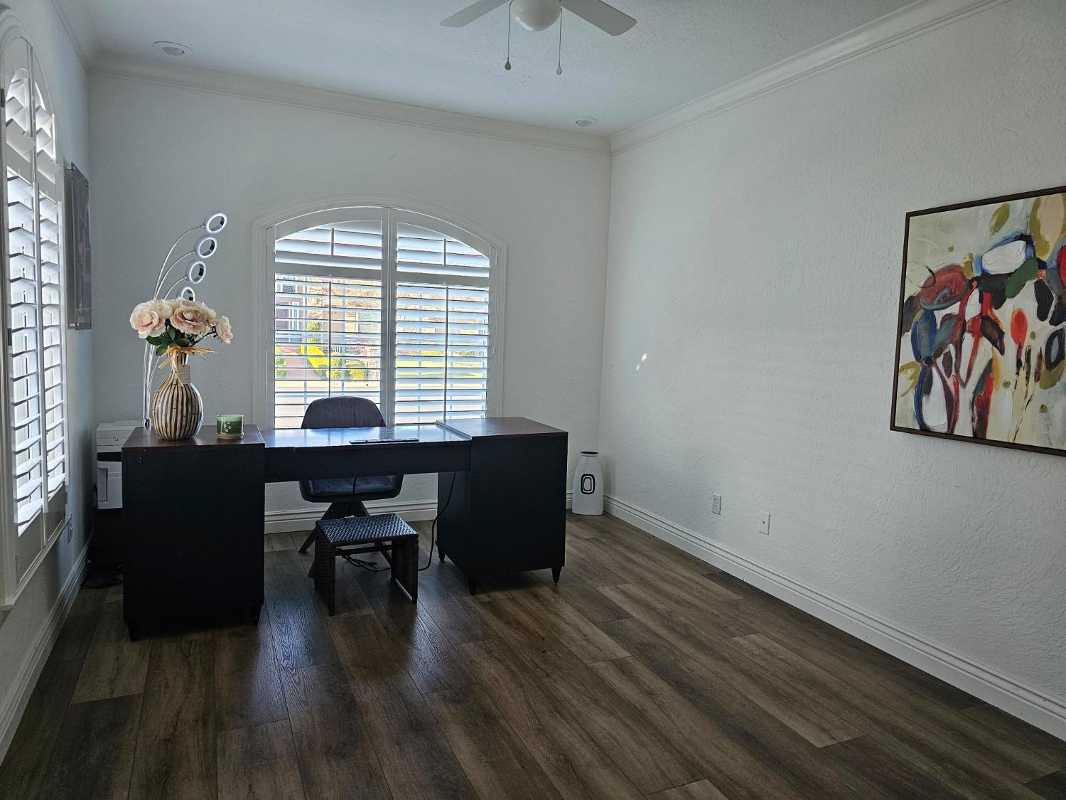 576 West Bedford Avenue Clovis, CA 93611 - Photo 58 of 79 a view of a workspace with furniture and a window