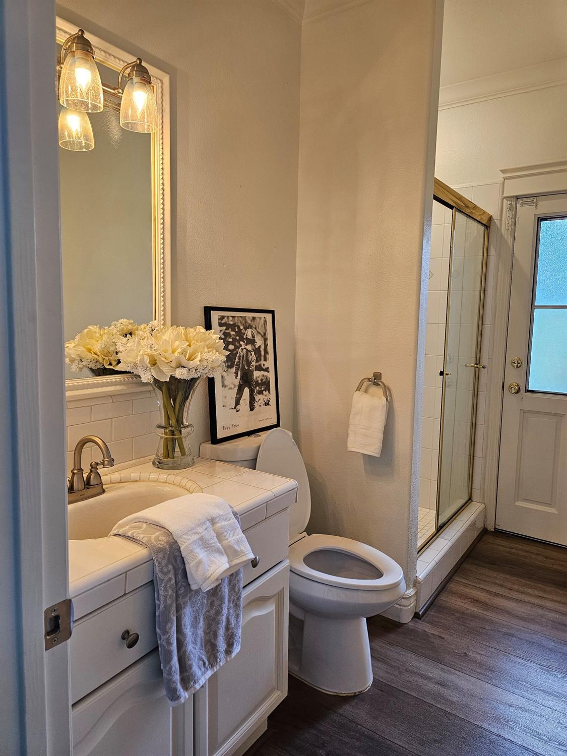 576 West Bedford Avenue Clovis, CA 93611 - Photo 61 of 79 a bathroom with a sink and a toilet