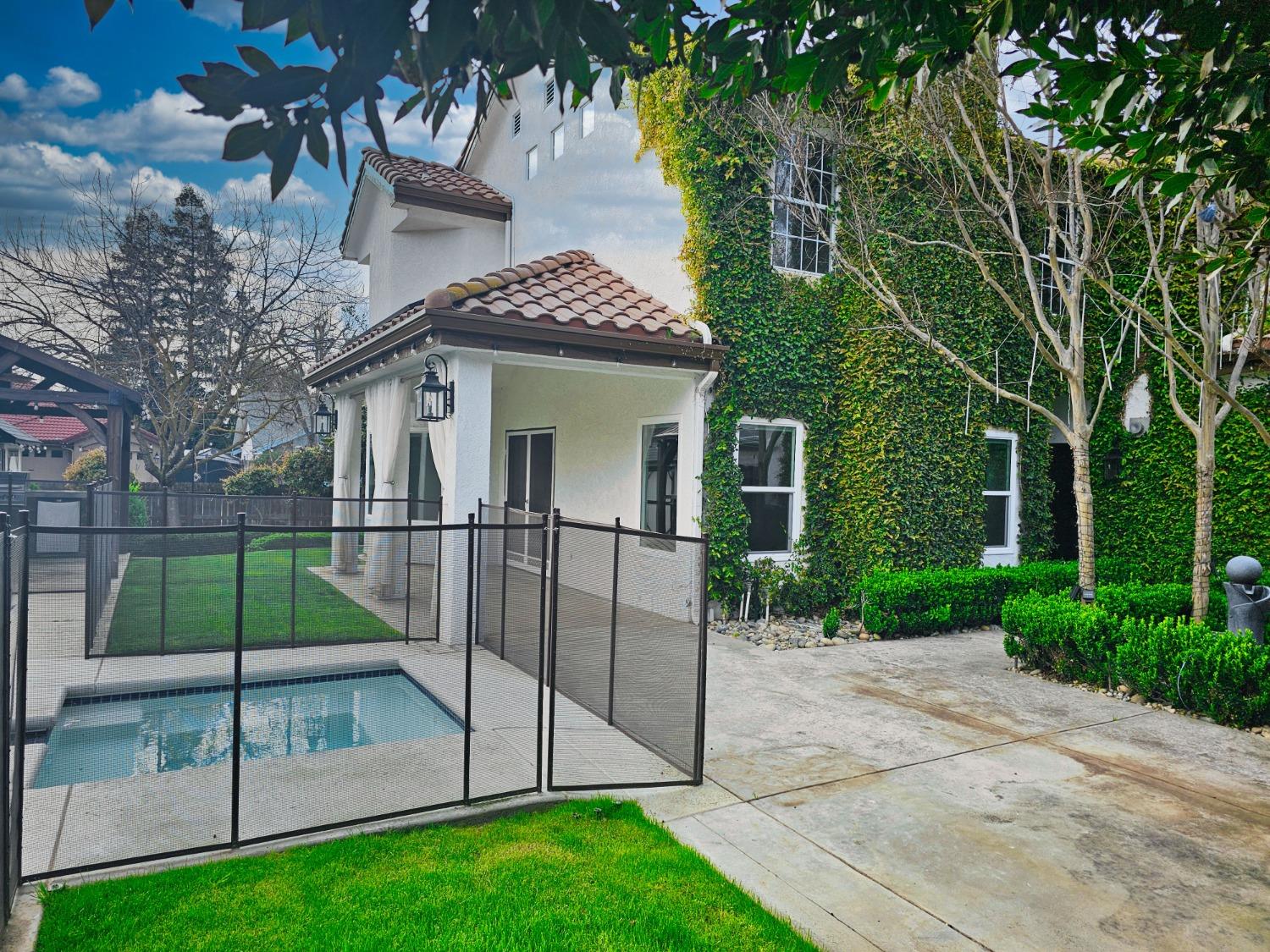 576 West Bedford Avenue Clovis, CA 93611 - Photo 77 of 79 a view of a house with a yard