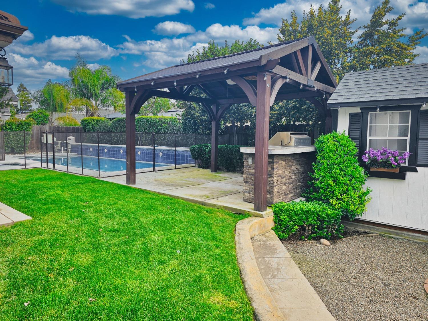 576 West Bedford Avenue Clovis, CA 93611 - Photo 78 of 79 a view of a house with a yard