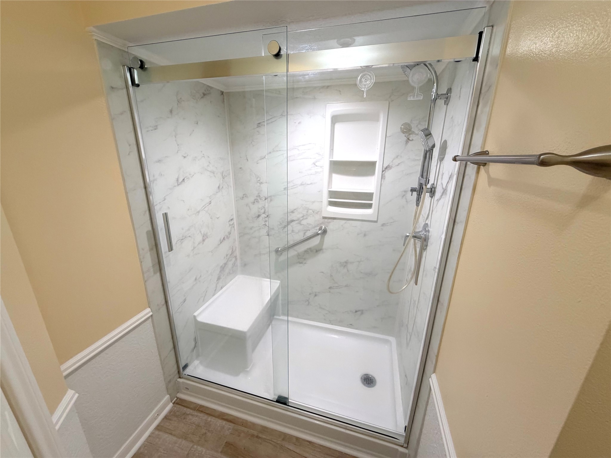 20723 Trellis Lane Houston, TX 77073 - Photo 24 of 29 a bathroom with a glass door shower and toilet