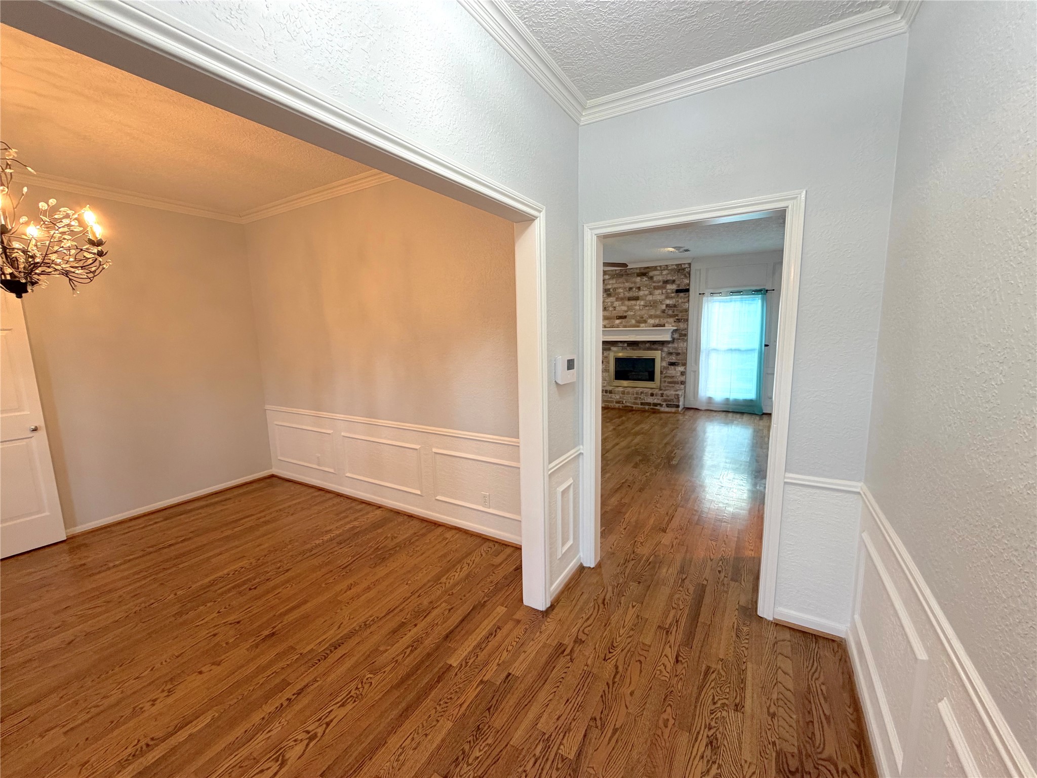 20723 Trellis Lane Houston, TX 77073 - Photo 5 of 29 wooden floor in an empty room with a window