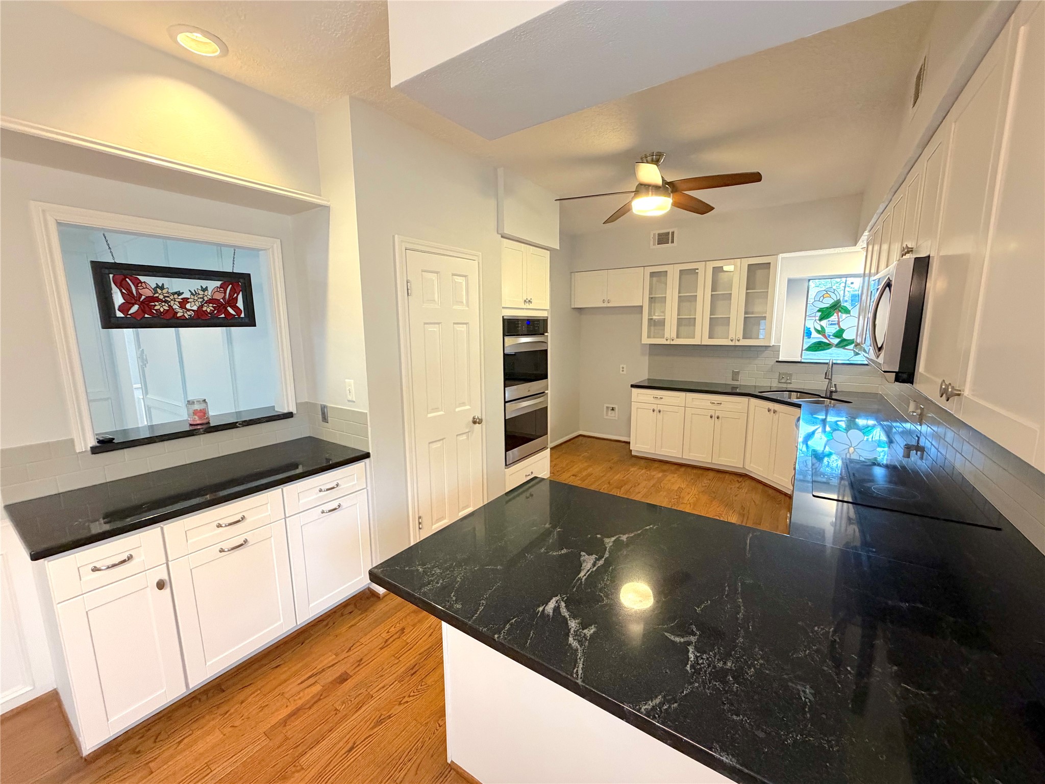 20723 Trellis Lane Houston, TX 77073 - Photo 8 of 29 a kitchen with stainless steel appliances granite countertop a stove a sink and a refrigerator