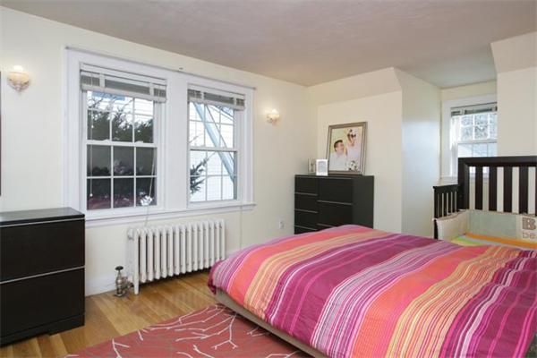 69 Falmouth Road Newton, MA 02465 - Photo 5 of 5 a bedroom with a bed and a window