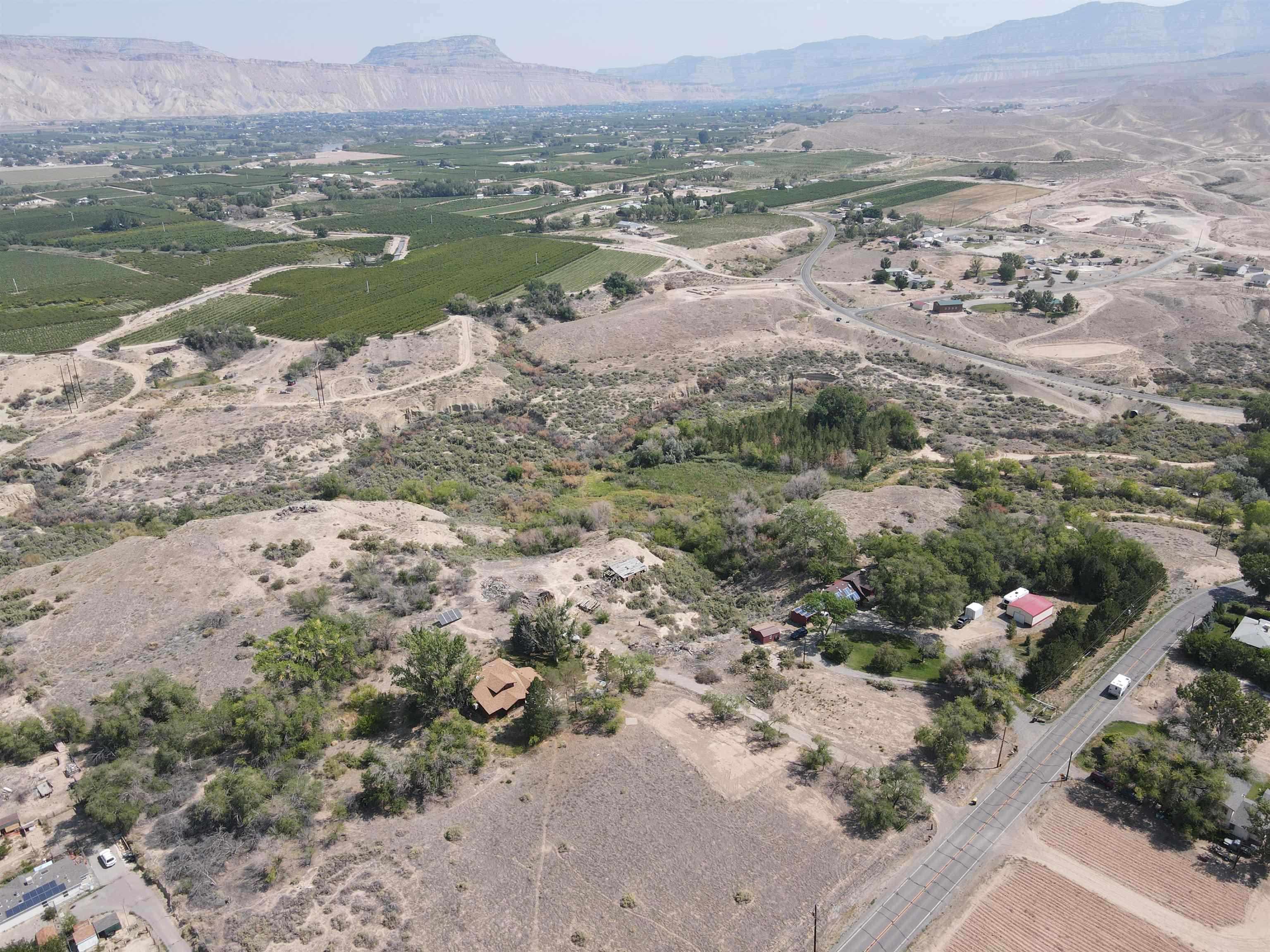 Tbd D Road Palisade, CO 81526 - Photo 7 of 11 a view of a lake with mountain