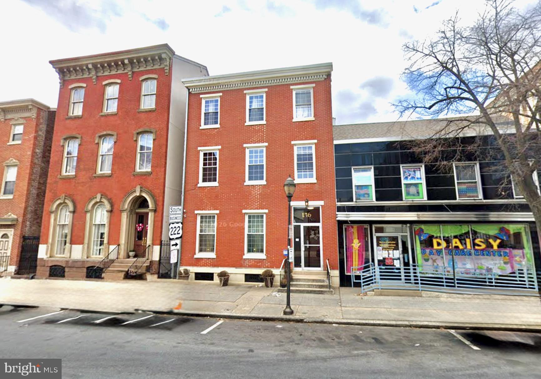a front view of a brick building