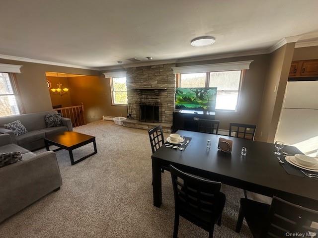 333 Collabar Road Montgomery, NY 12549 - Photo 2 of 10 a living room with furniture a window and a flat screen tv