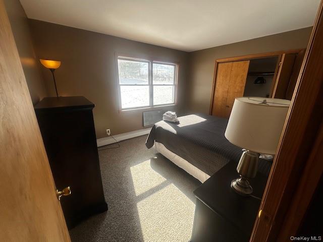 333 Collabar Road Montgomery, NY 12549 - Photo 5 of 10 a living room with furniture and a window