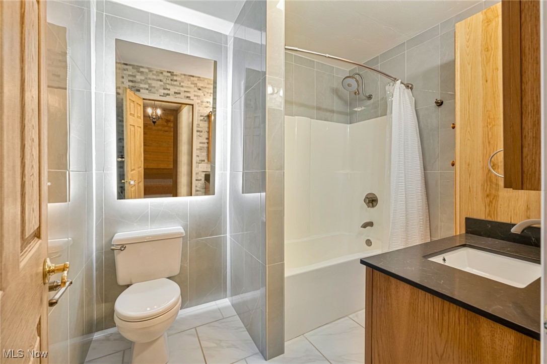 1623 Carson Road New Cumberland, WV 26047 - Photo 23 of 40 Full Bathroom with Tile Walls and Floors