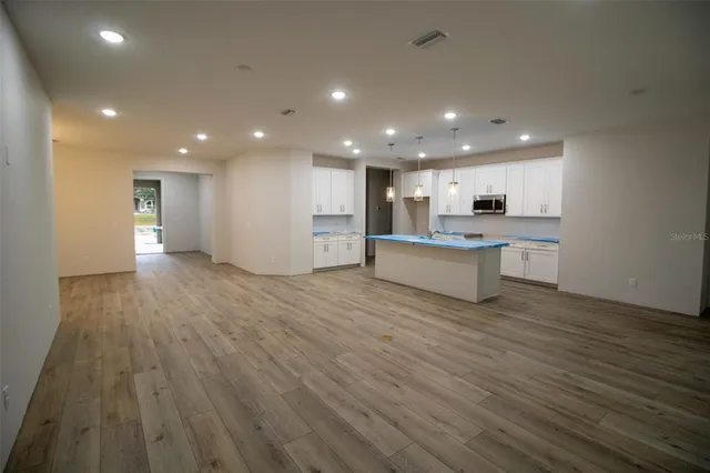 a view of backyard with trees