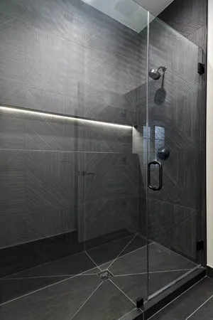 a kitchen with a sink and wooden floor