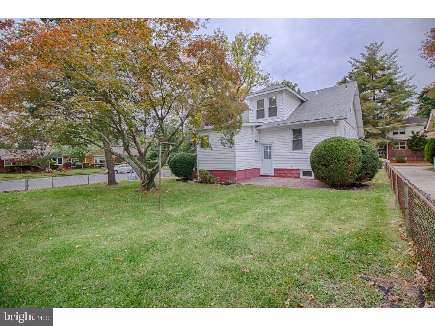 100 Princeton Road Audubon, NJ 08106 - Photo 19 of 20 a front view of a house with garden