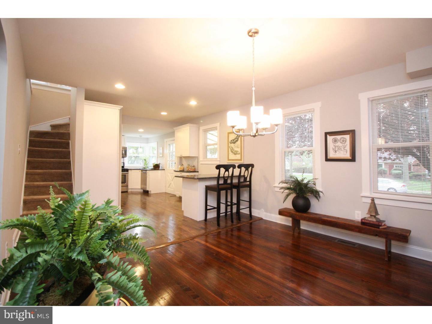 100 Princeton Road Audubon, NJ 08106 - Photo 3 of 20 a living room with furniture wooden floor and kitchen view