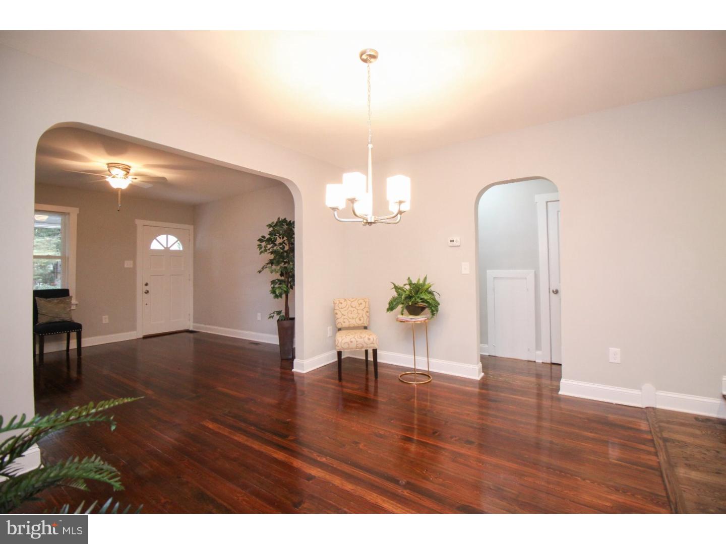 100 Princeton Road Audubon, NJ 08106 - Photo 6 of 20 a view of a room with wooden floor and potted plant