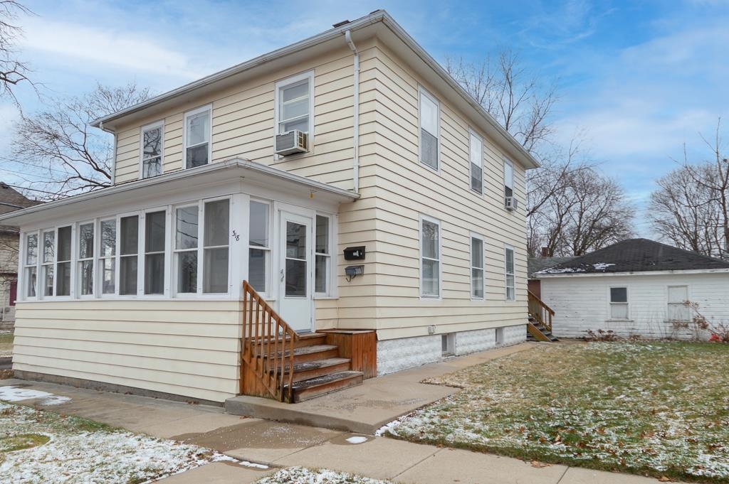 318 6th Avenue Rochelle, IL 61068 - Photo 1 of 11 a view of a house with a yard