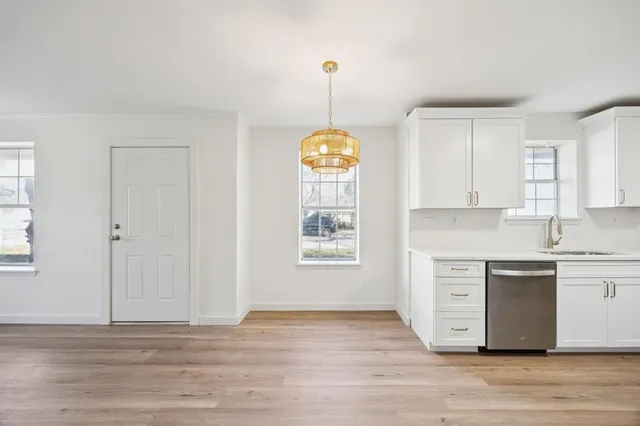 a view of an empty room and window