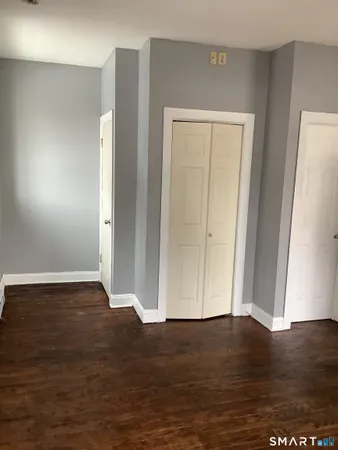a kitchen with a sink and a refrigerator