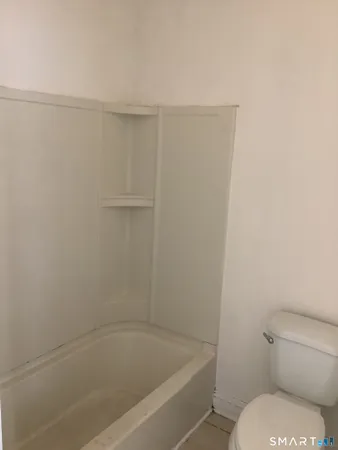 a close view of a shower in bathroom