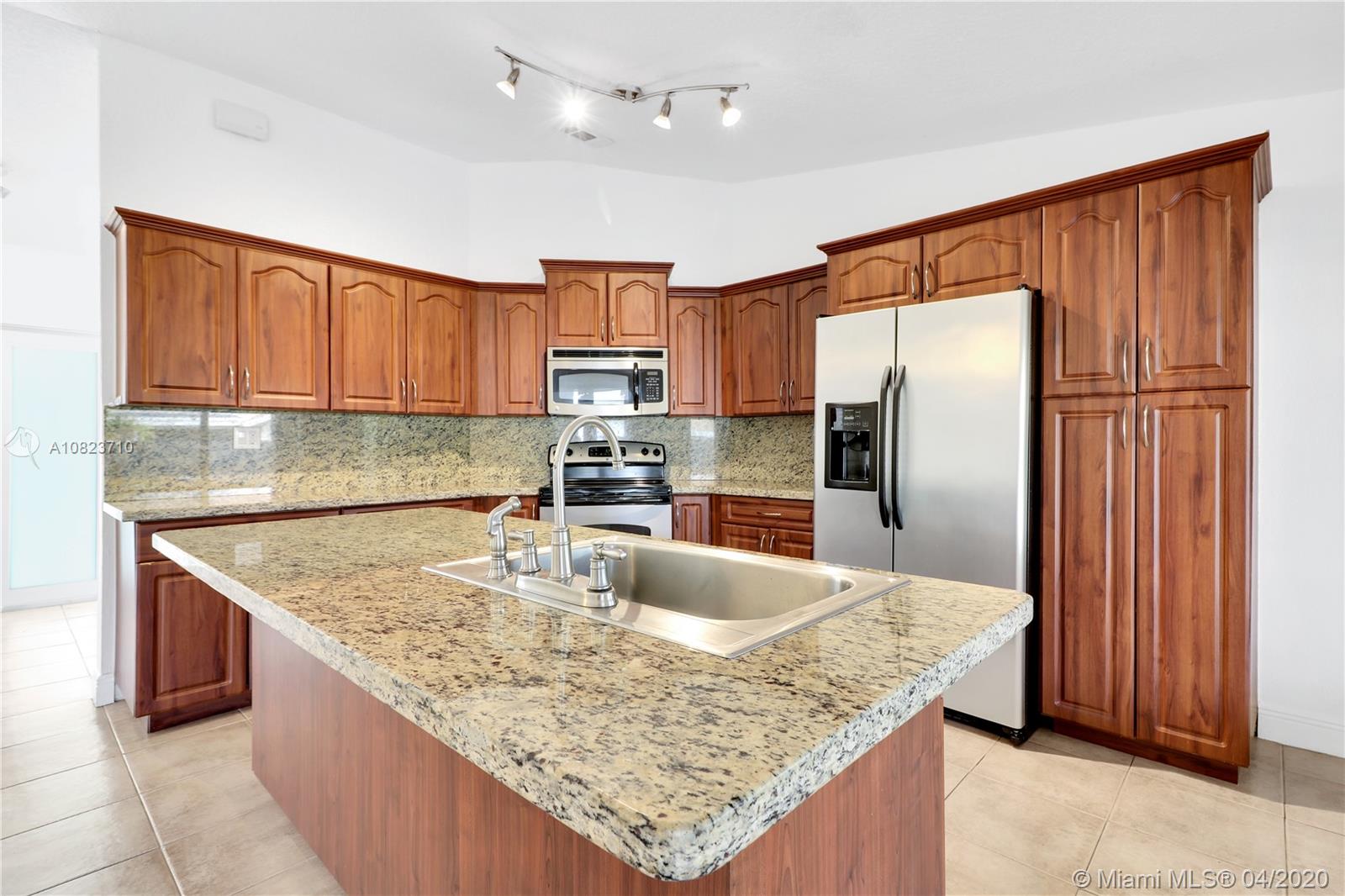 12851 Southwest 147th Lane Road Miami, FL 33186 - Photo 8 of 28 Gallery Image 8