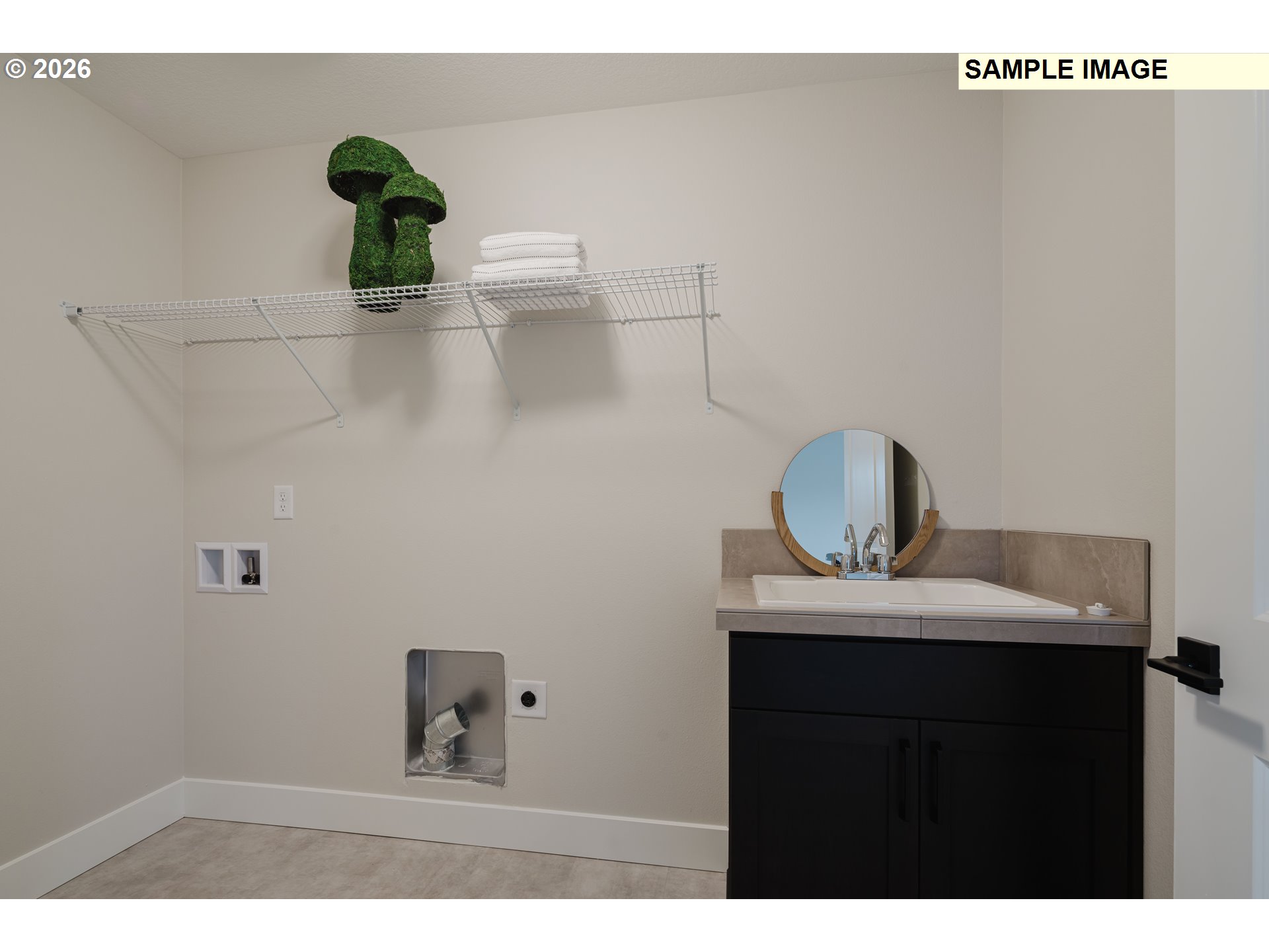 1403 North 41st Place Ridgefield, WA 98642 - Photo 27 of 30 a bathroom with a sink and vanity