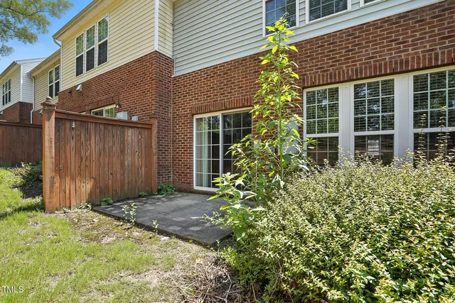 a house view with a garden space