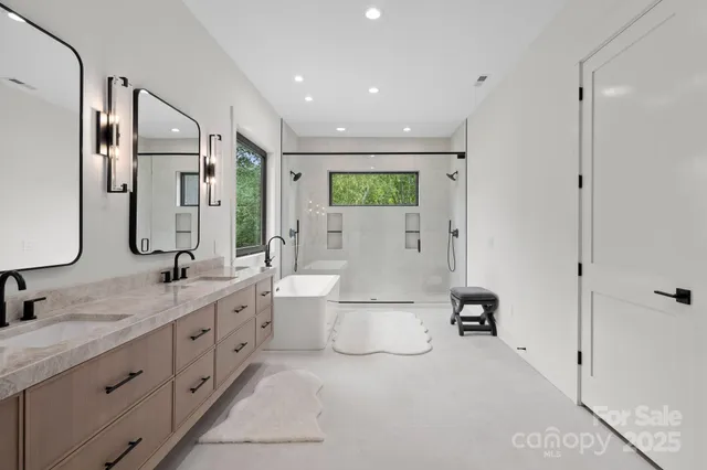 a bathroom with a bathtub and a sink