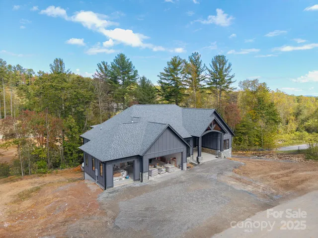 a house with trees in the background