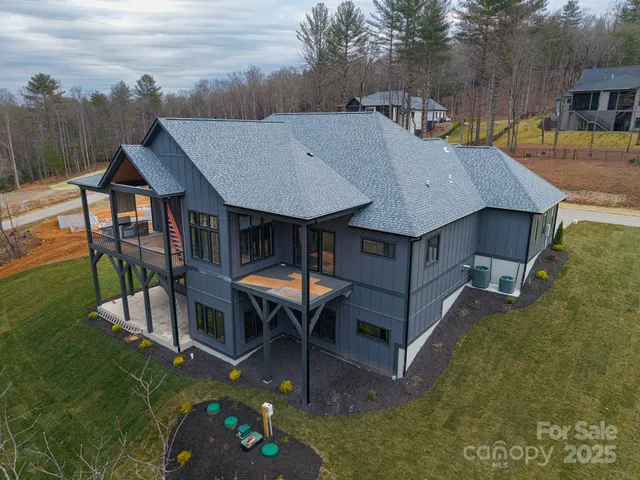 a terrace of a house with table and chairs