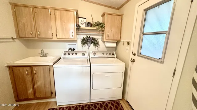 a bathroom with a sink toilet and mirror