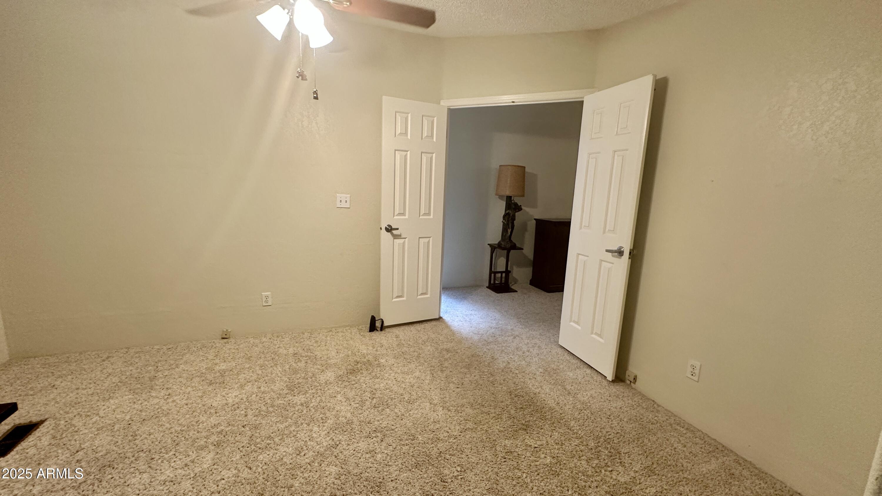 834 South Meridian Road, Unit 76 Apache Junction, AZ 85120 - Photo 41 of 50 an empty room with a bathroom