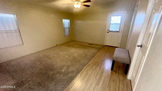 a bathroom with a double vanity sink a mirror and a shower