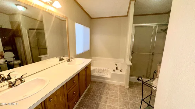 a bathroom with a bathtub and shower
