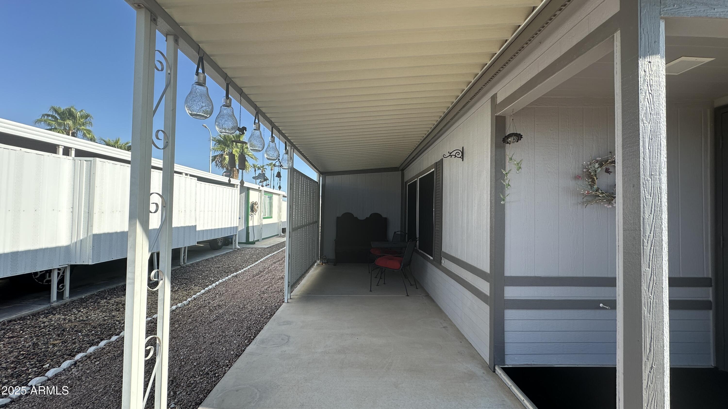 834 South Meridian Road, Unit 76 Apache Junction, AZ 85120 - Photo 5 of 50 a view of a balcony door