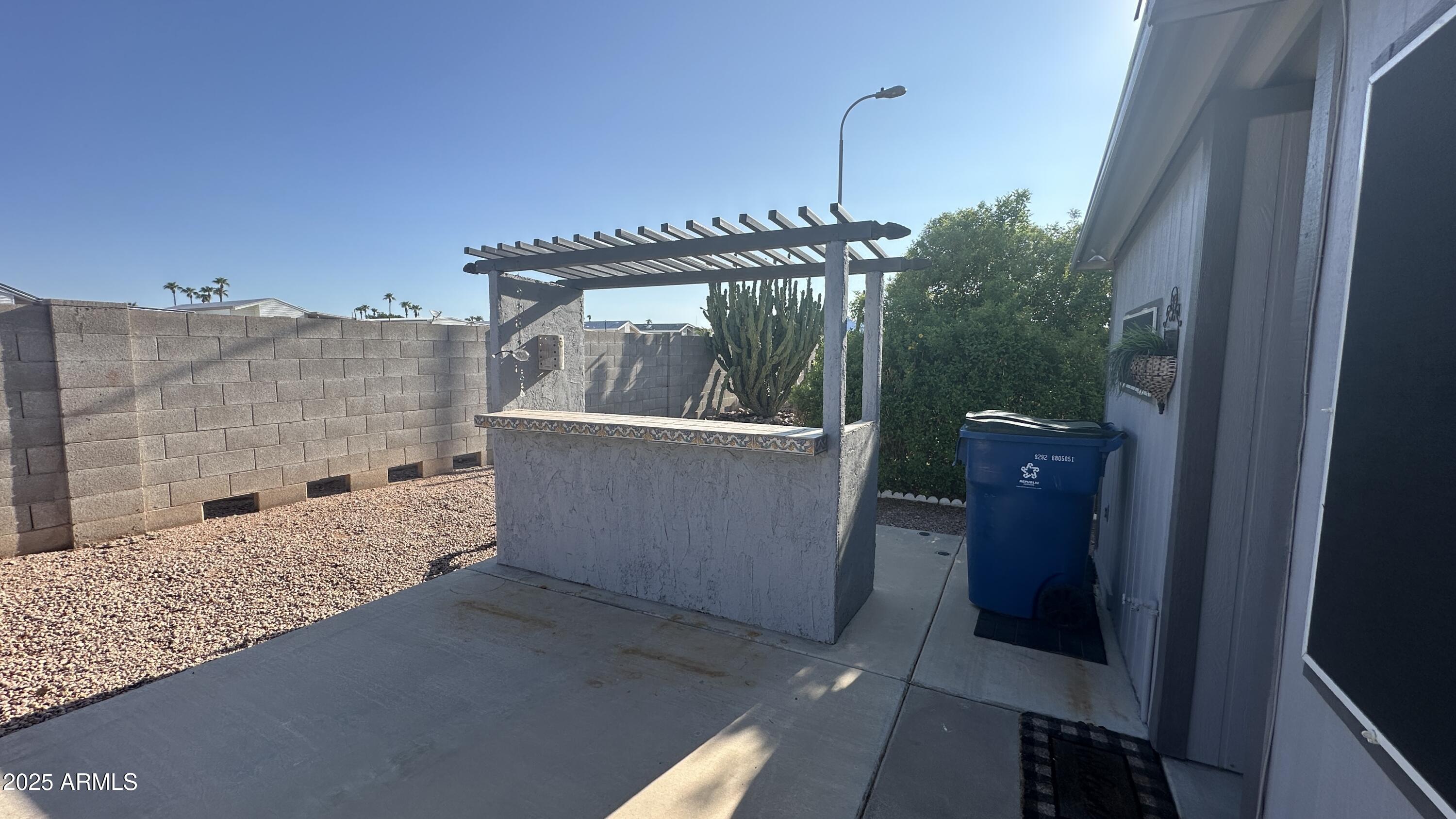 834 South Meridian Road, Unit 76 Apache Junction, AZ 85120 - Photo 9 of 50 a view of a balcony