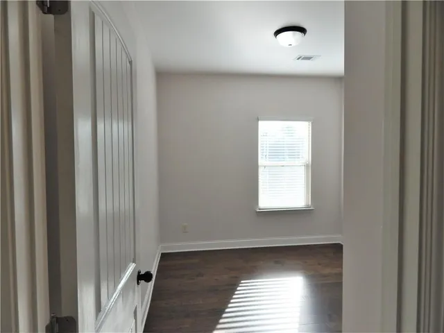 a white bath tub sitting in a bathroom