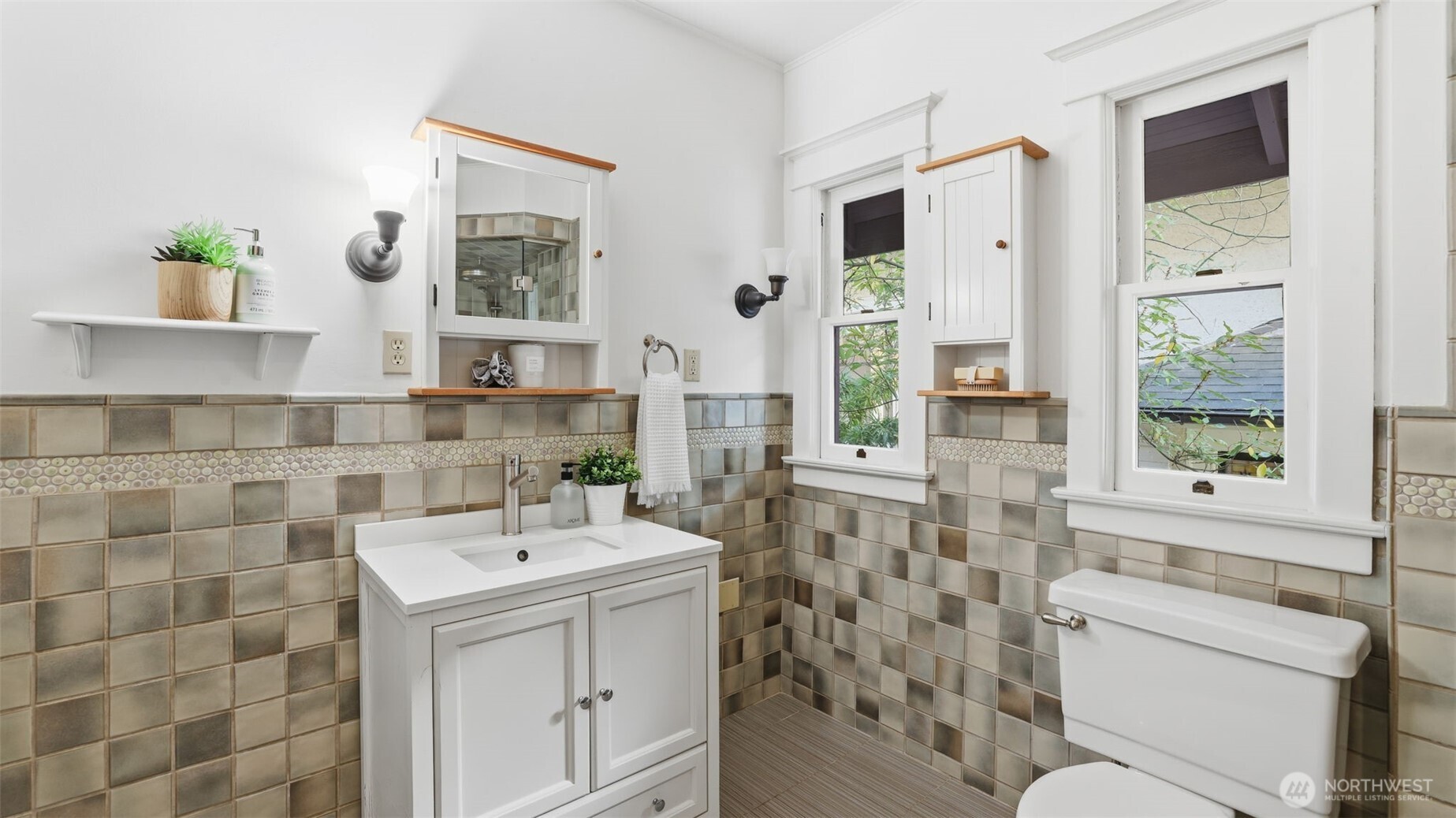 908 15th Avenue East Seattle, WA 98112 - Photo 28 of 37 a bathroom with a sink toilet and shower