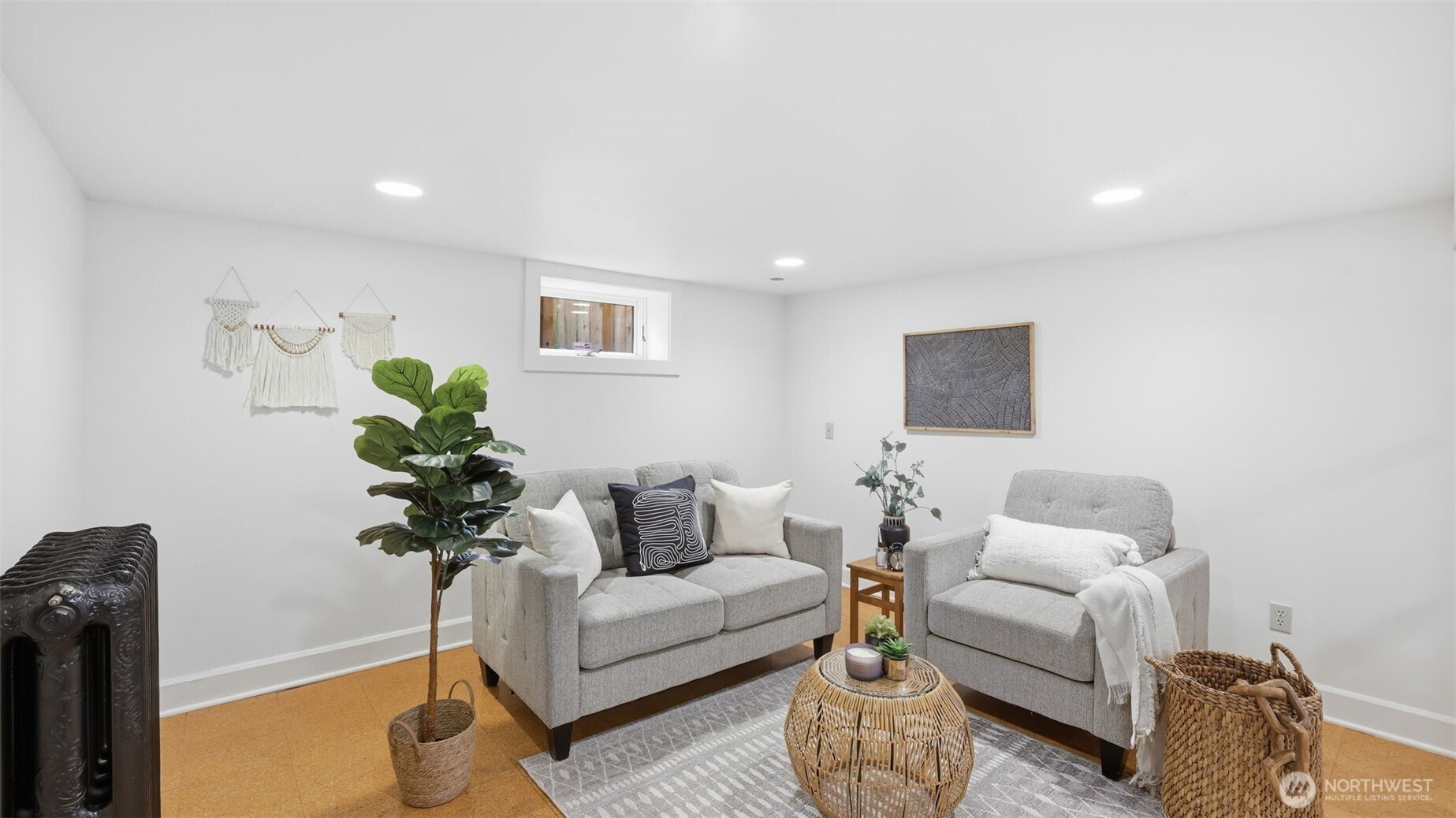 908 15th Avenue East Seattle, WA 98112 - Photo 31 of 37 a living room with furniture flowerpot and a potted plant