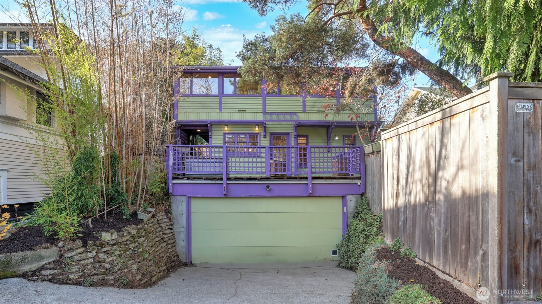 908 15th Avenue East Seattle, WA 98112 - Photo 37 of 37 a front view of a house with a yard