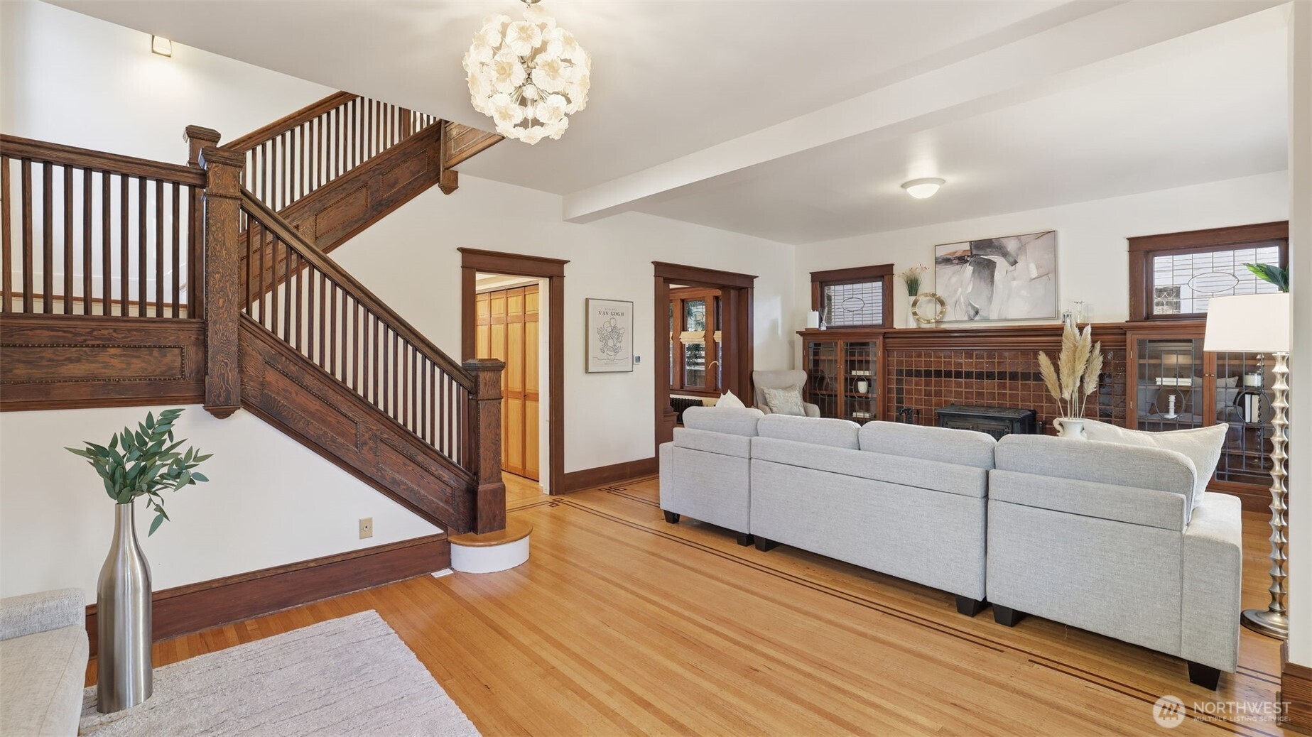908 15th Avenue East Seattle, WA 98112 - Photo 6 of 37 a living room with furniture and wooden floor
