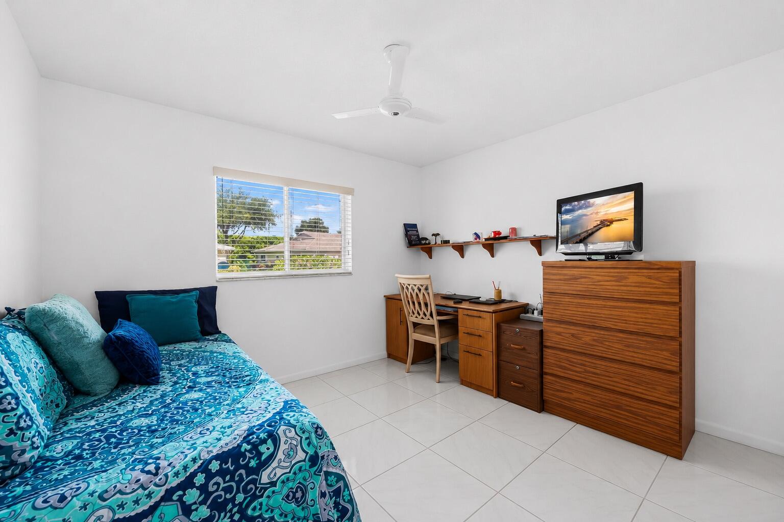 18762 Candlewick Drive Boca Raton, FL 33496 - Photo 14 of 52 a bedroom with a bed and furniture